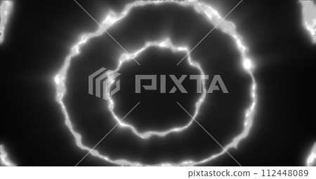 Abstract background looped circles a tunnel of flying black and white rings of energy plasma with a glow effect shiny festive bright beautiful futuristic hi-tech 112448089