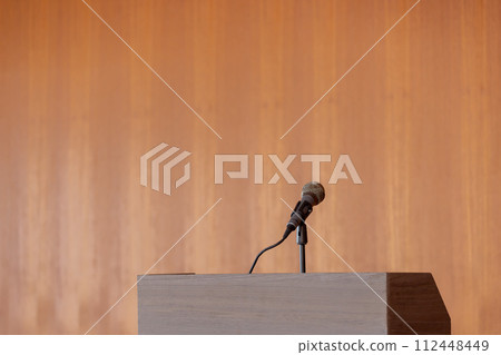Podium and microphone 112448449