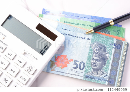 Malaysian currency, ringgit (MYR) banknotes and calculator 112449969