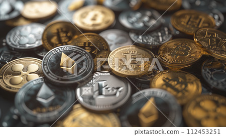 A pile of coins with different symbols on them, including a B and a L A pile of coins with different symbols on them, including a B and a L 112453251