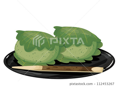 Two pieces of mugwort kashiwa mochi placed on a tray. Two pieces of mugwort kashiwa mochi placed on a tray. 112453267