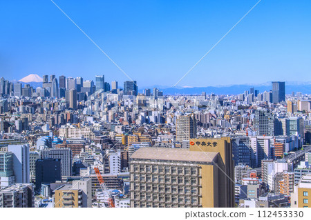 New view of Tokyo cityscape in Japan. Shinjuku is transforming into Mt. Fuji. On the left is Shinjuku Park Tower. The majesty of Tokyu Kabukicho Tower New view of Tokyo cityscape in Japan. Shinjuku is transforming into Mt. Fuji. On the left is Shinjuku Park Tower. The majesty of Tokyu Kabukicho Tower 112453330
