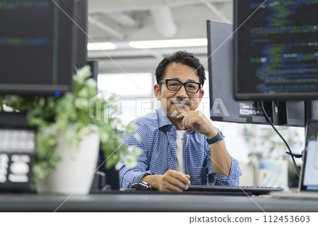 Image of a veteran engineer in his 50s Image of a veteran engineer in his 50s 112453603