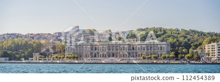 landscape scenery of Dolmabahce palacewith reflection, istanbul, turkey waterfront view from bosporus BANNER, LONG FORMAT landscape scenery of Dolmabahce palacewith reflection, istanbul, turkey waterfront view from bosporus BANNER, LONG FORMAT 112454389