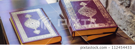 Quran holy book of Muslims in the mosque BANNER, LONG FORMAT Quran holy book of Muslims in the mosque BANNER, LONG FORMAT 112454433