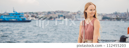 Woman tourist enjoying Galataport area view, cruise port of Istanbul newly opening in 2021, located in the shores of the Galata, Karakoy in Istanbul BANNER, LONG FORMAT 112455203