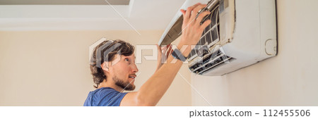 technician service removing air filter of the air conditioner for cleaning BANNER, LONG FORMAT technician service removing air filter of the air conditioner for cleaning BANNER, LONG FORMAT 112455506