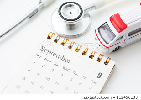 September calendar with stethoscope and ambulance September calendar with stethoscope and ambulance 112456138