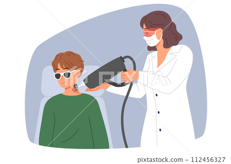 Doctor removes tattoo from man neck using laser medical equipment to clear ink from skin Doctor removes tattoo from man neck using laser medical equipment to clear ink from skin 112456327