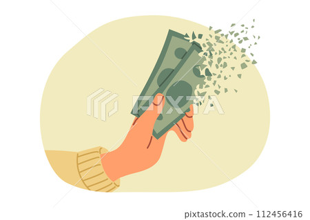 Money in person hands quickly disappears due to high inflation caused by crisis. 112456416