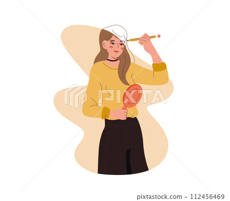 Woman draws own image with pencil and holds mirror as metaphor for working to improve personality 112456469