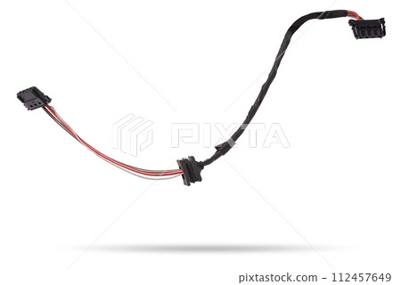 A cable of matted wires of different colors with connectors in the electrical wiring of the car. Internet line in the work of the provider. 112457649