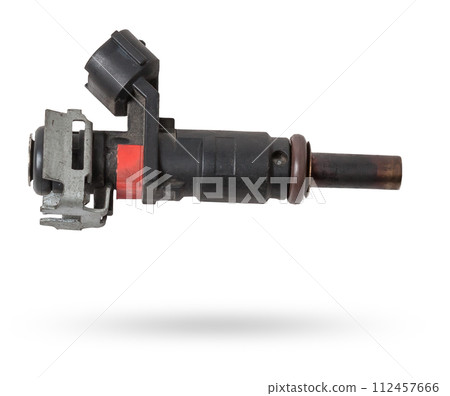 Close-up on a car fuel injector for supplying gasoline to cylinder engine on a white isolated background. Spare parts catalog. Close-up on a car fuel injector for supplying gasoline to cylinder engine on a white isolated background. Spare parts catalog. 112457666