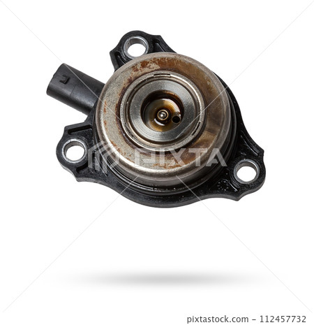 Electromagnetic crankshaft position sensor of a car engine in the hands of an auto mechanic. Spare parts catalog. Electromagnetic crankshaft position sensor of a car engine in the hands of an auto mechanic. Spare parts catalog. 112457732