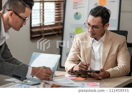 Group of various generation businessperson working in the office. Management strategy. Group of various generation businessperson working in the office. Management strategy. 112459555