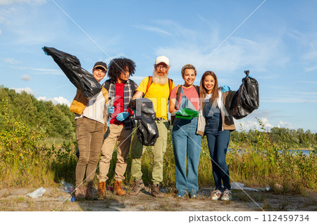 Dedicated Volunteers Positively Impacting Environment with Lake Clean-Up 112459734