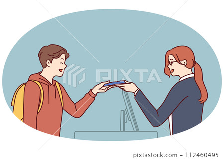 Woman working as secretary or at hotel at reception serves man by holding out magnetic key 112460495