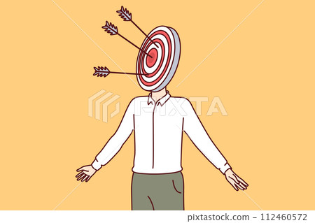 Man with target on head symbolizes targeted marketing and having portrait of potential client Man with target on head symbolizes targeted marketing and having portrait of potential client 112460572