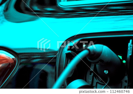 charging a car with a power station charging a car with a power station 112460746