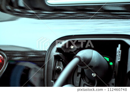 driving a car on a road driving a car on a road 112460748