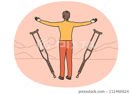 Disabled man let go of crutches watch sunset 112460824