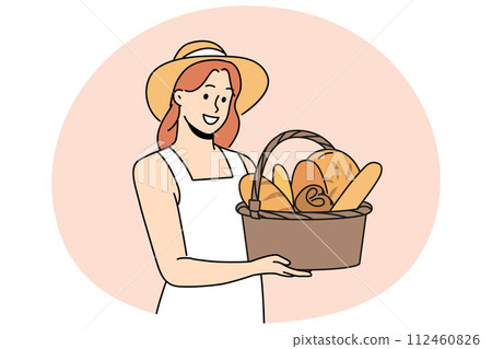 Smiling woman with basket of fresh bread Smiling woman with basket of fresh bread 112460826
