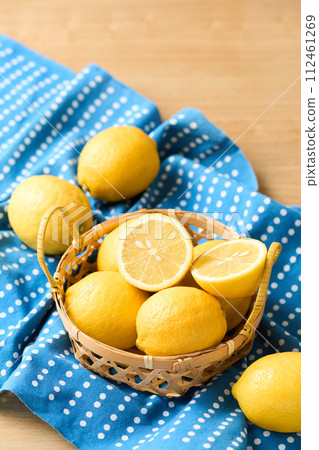 Domestic lemons in a basket 112461269