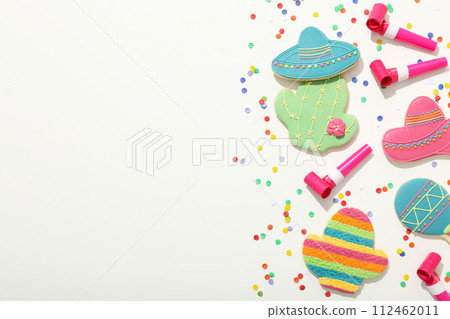 Cinco de Mayo celebration concept, festive decorations on a white background 112462011