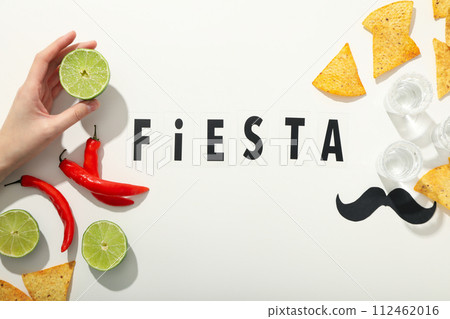The inscription Fiesta with decorations on a white background 112462016