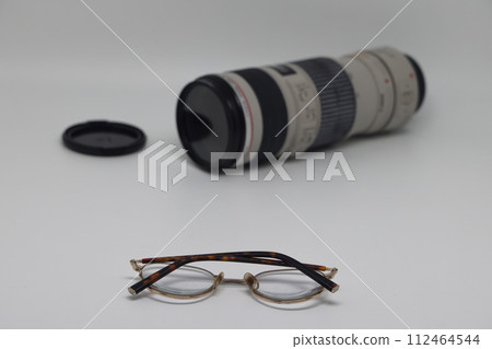 Camera, money, glasses, lens and Travel concept image Camera, money, glasses, lens and Travel concept image 112464544