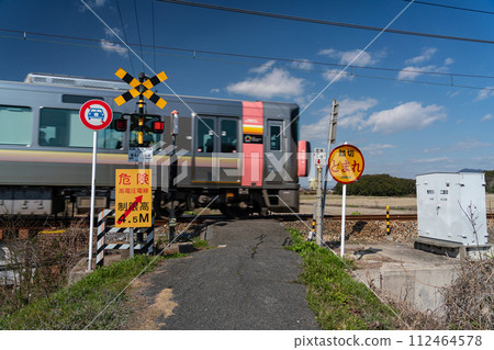 Type 3 railroad crossing Uno Line Hidetenkawa 2 level crossing 1 where Urara bound for Uno is passing Tamano City, Okayama Prefecture 112464578