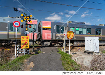 Type 3 railroad crossing Uno Line Hidetenkawa 2 railroad crossing 3 where Urara bound for Uno is passing Tamano City, Okayama Prefecture 112464580