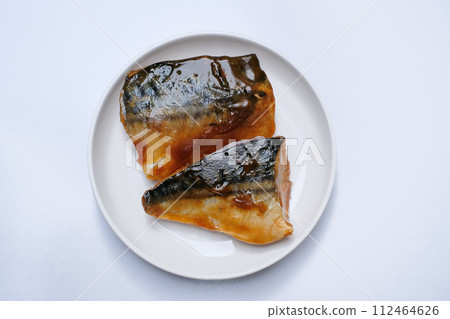 Miso-stewed mackerel on a white plate Miso-stewed mackerel on a white plate 112464626