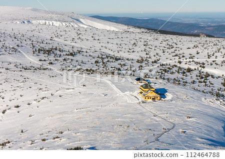 Winter morning, view from Snezka to Silesian house, krkonose mountains. Snezka is mountain on the border between Czech Republic and Poland. Winter morning, view from Snezka to Silesian house, krkonose mountains. Snezka is mountain on the border between Czech Republic and Poland. 112464788