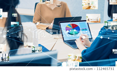 People in a meeting and property photos Real estate investment design office 112465731