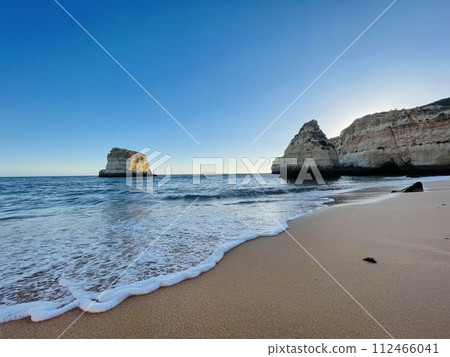Algarve region in Portugal. A view of a Praia da Rocha in Portimao. 112466041