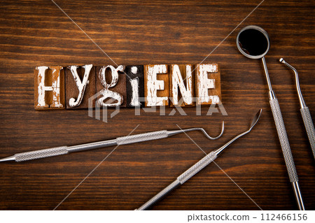 Hygiene. Health concept. Alphabet blocks on wood texture background 112466156