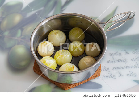 small onions pickled in soy sauce 112466596