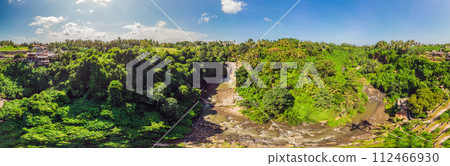 Tegenungan Waterfall near Ubud, Bali, Indonesia. Tegenungan Waterfall is a popular destination for tourists visiting Bali, Indonesia Tegenungan Waterfall near Ubud, Bali, Indonesia. Tegenungan Waterfall is a popular destination for tourists visiting Bali, Indonesia 112466930