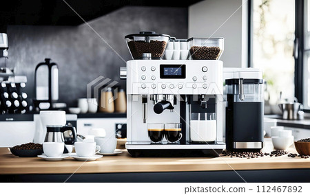 Modern coffee machine with cups on table in kitchen. Modern coffee machine in the process of producing aromatic coffee 112467892