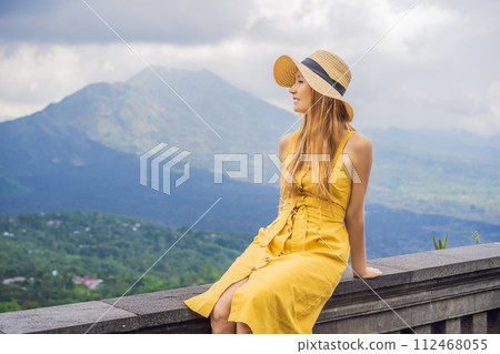 Woman traveler looking at Batur volcano. Indonesia 112468055
