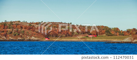 Norwegian panoramic landscape, coastal view with colorful wooden houses Norwegian panoramic landscape, coastal view with colorful wooden houses 112470031