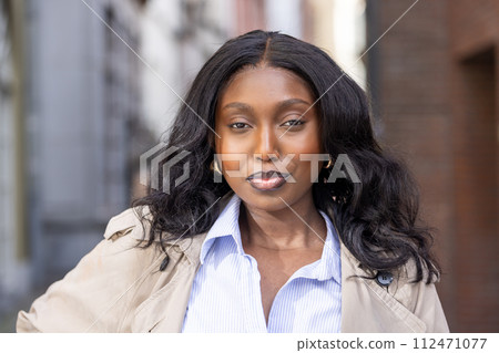 Confident Young African Woman in Urban Setting 112471077