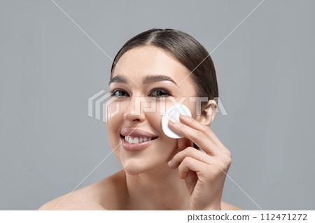 Woman Cleaning Face With White Pad. Beautiful Girl Removing Makeup White Cosmetic Cotton Pad. Happy Smiling Female Taking Off Makeup From Facial Skin With Cosmetic Pad. Face Skin Care. Woman Cleaning Face With White Pad. Beautiful Girl Removing Makeup White Cosmetic Cotton Pad. Happy Smiling Female Taking Off Makeup From Facial Skin With Cosmetic Pad. Face Skin Care. 112471272