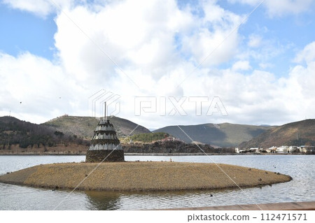 pagoda on island at lake of Ganden Sumtseling Monastery lama monk temple from Tibet culture in China 112471571