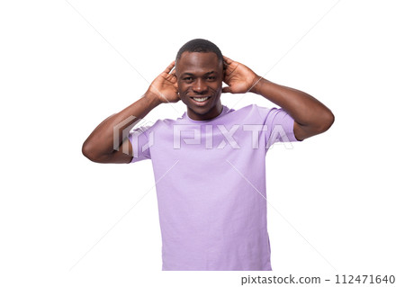 young smart handsome african man in lilac t-shirt thought 112471640