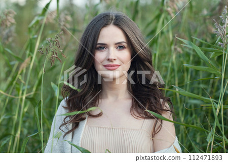 Romantic female model with makeup, clean skin, healthy hairstyle Romantic female model with makeup, clean skin, healthy hairstyle 112471893
