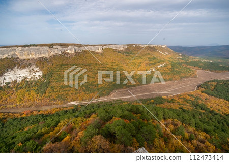 The autumn landscape of the mountain valley is an amazing, beautiful place at any time of the year. Hiking. Nature 112473414