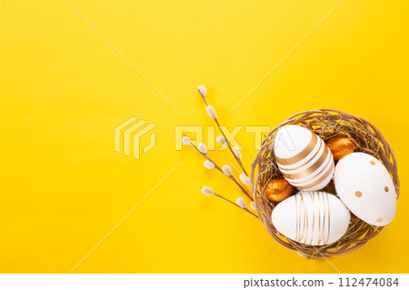 Easter eggs on yellow background. Greetings card, Happy Easters. Flat lay ,top view 112474084