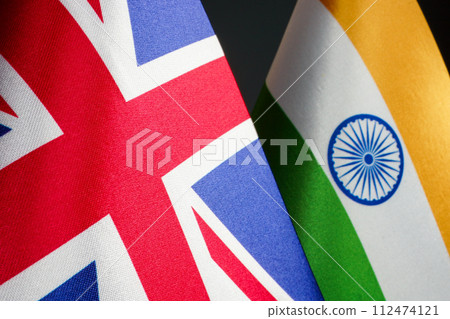 Close-up of the UK and Indian flags. Close-up of the UK and Indian flags. 112474121